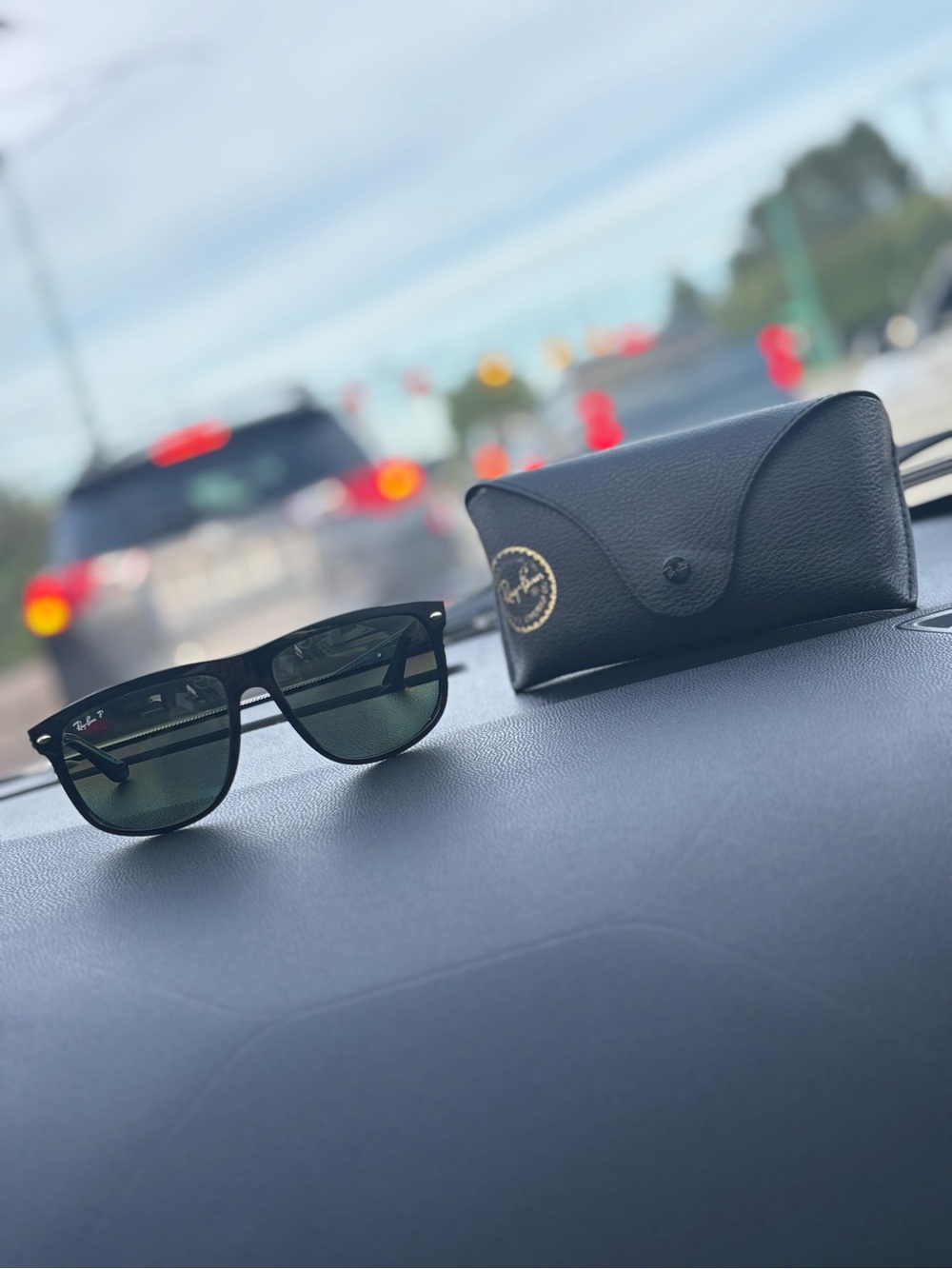 Ray-Ban Black Sunglasses with Gold Logo Accent